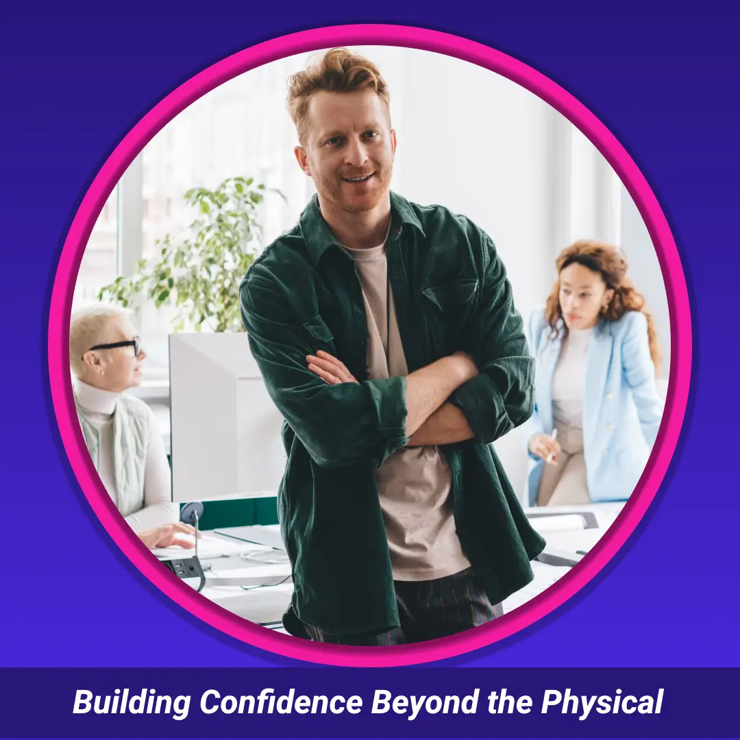 Building Confidence Beyond the Physical: smiling man with arms crossed in an office